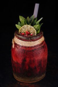 exotic tropical cocktail on black background